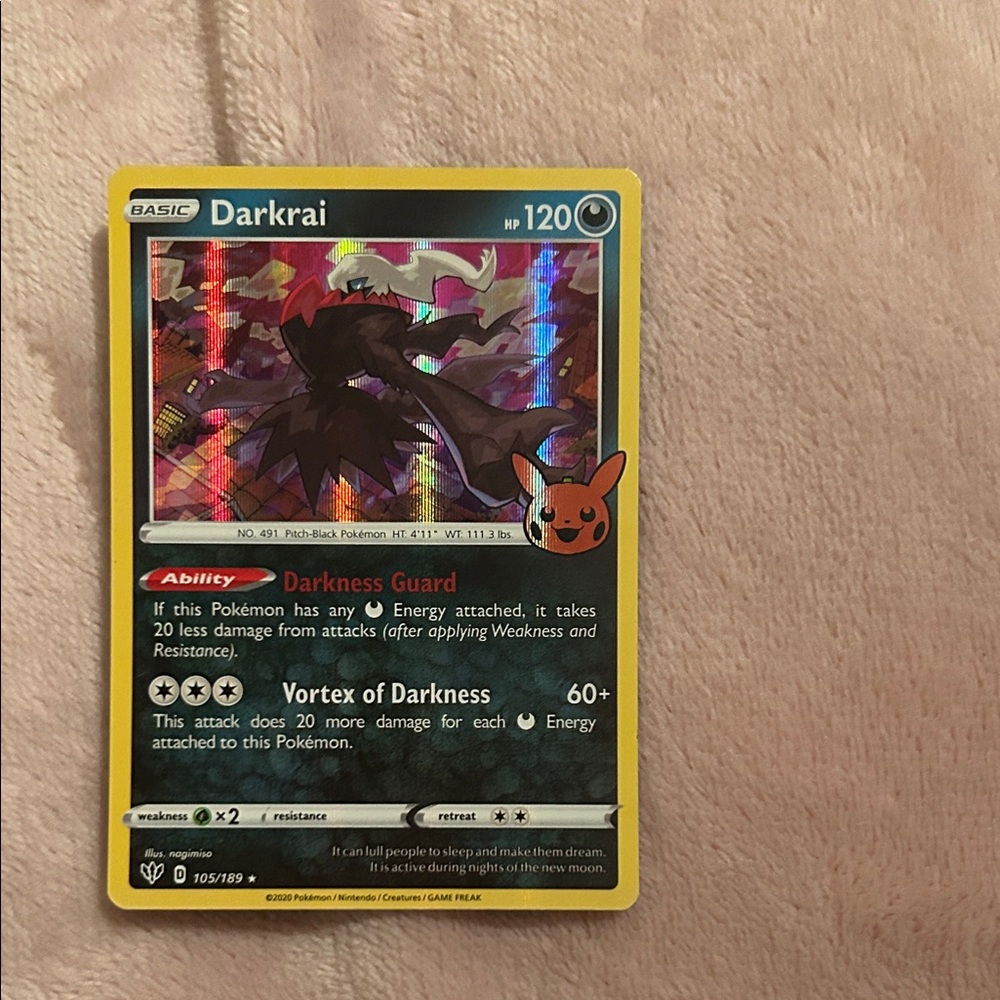 Pokemon Darkrai Card with Black and Yellow